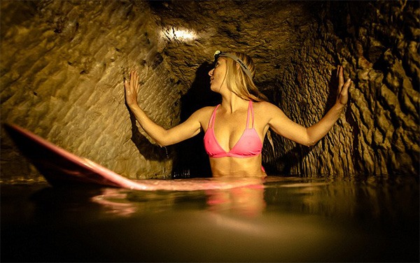 American Woman In Bikini Desecrates French Catacombs For Her “Female Indiana Jones” Brand