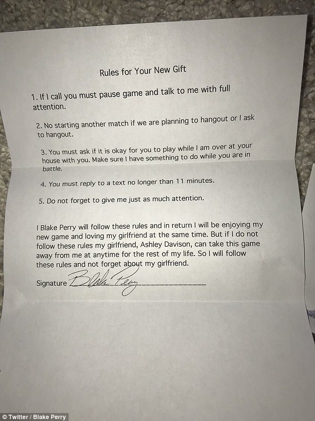 American Man Signs Demanding Contract With Girlfriend To Receive Video Game For Christmas